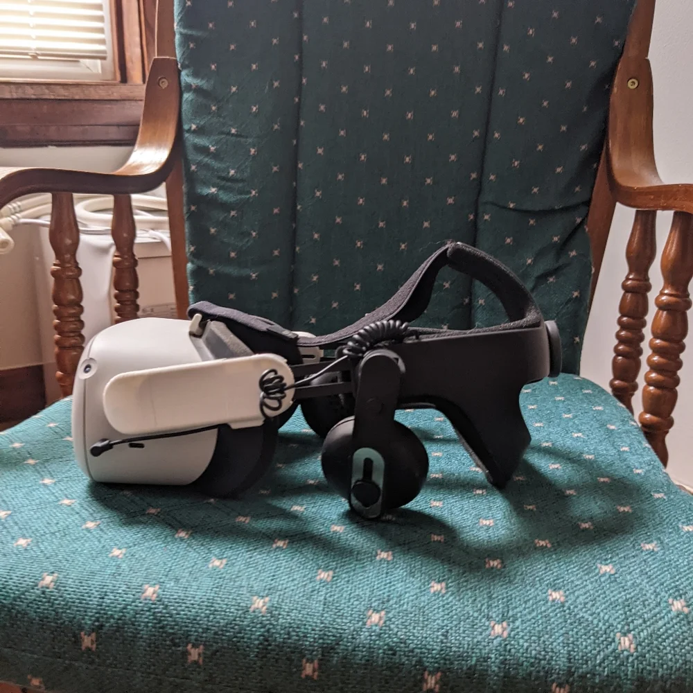 Oculus Quest 2 with added modified headpiece, remotes, and charger
